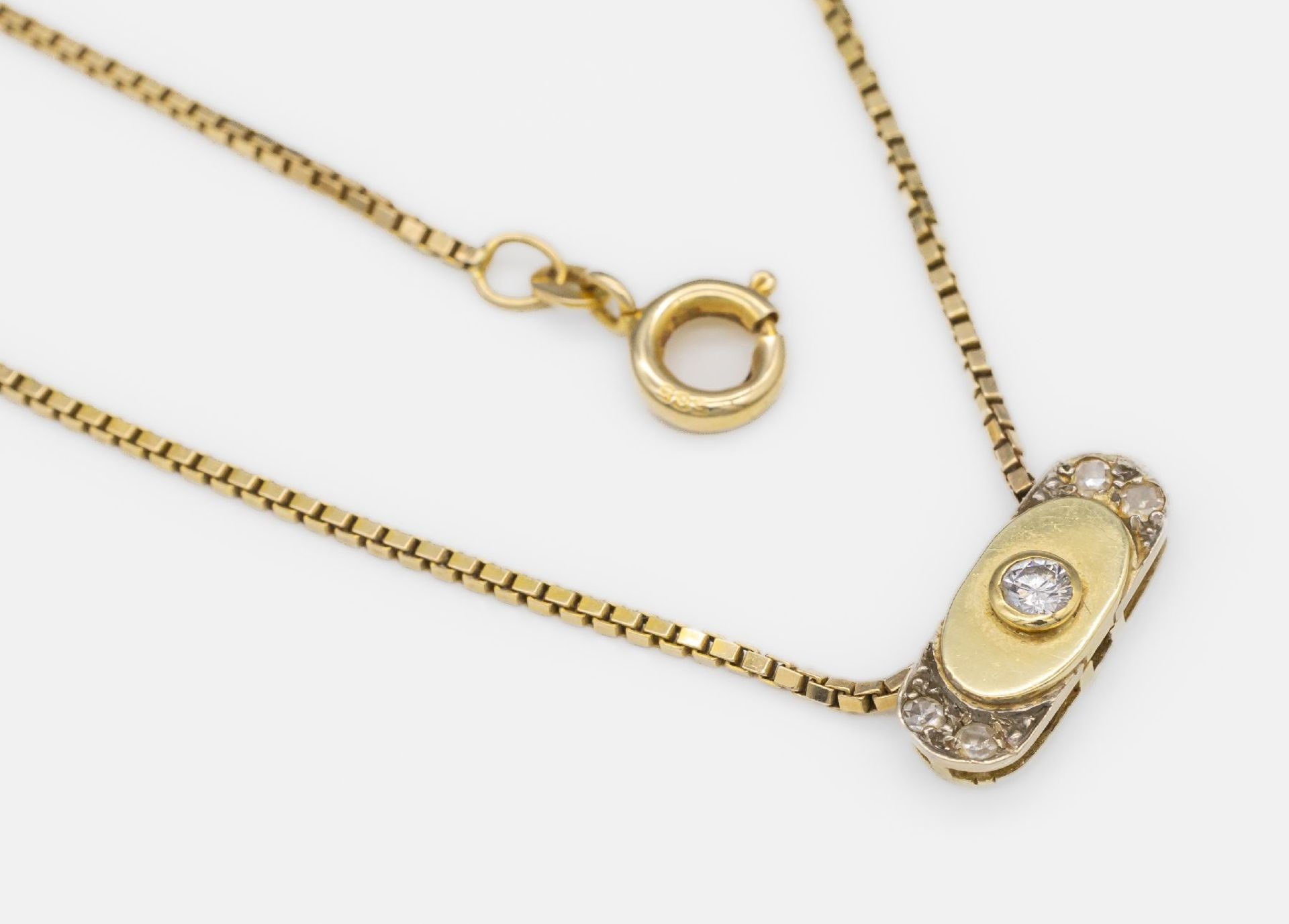 14 kt Gold Diamant-Collier, GG 585/000, 1 Brillant und 4