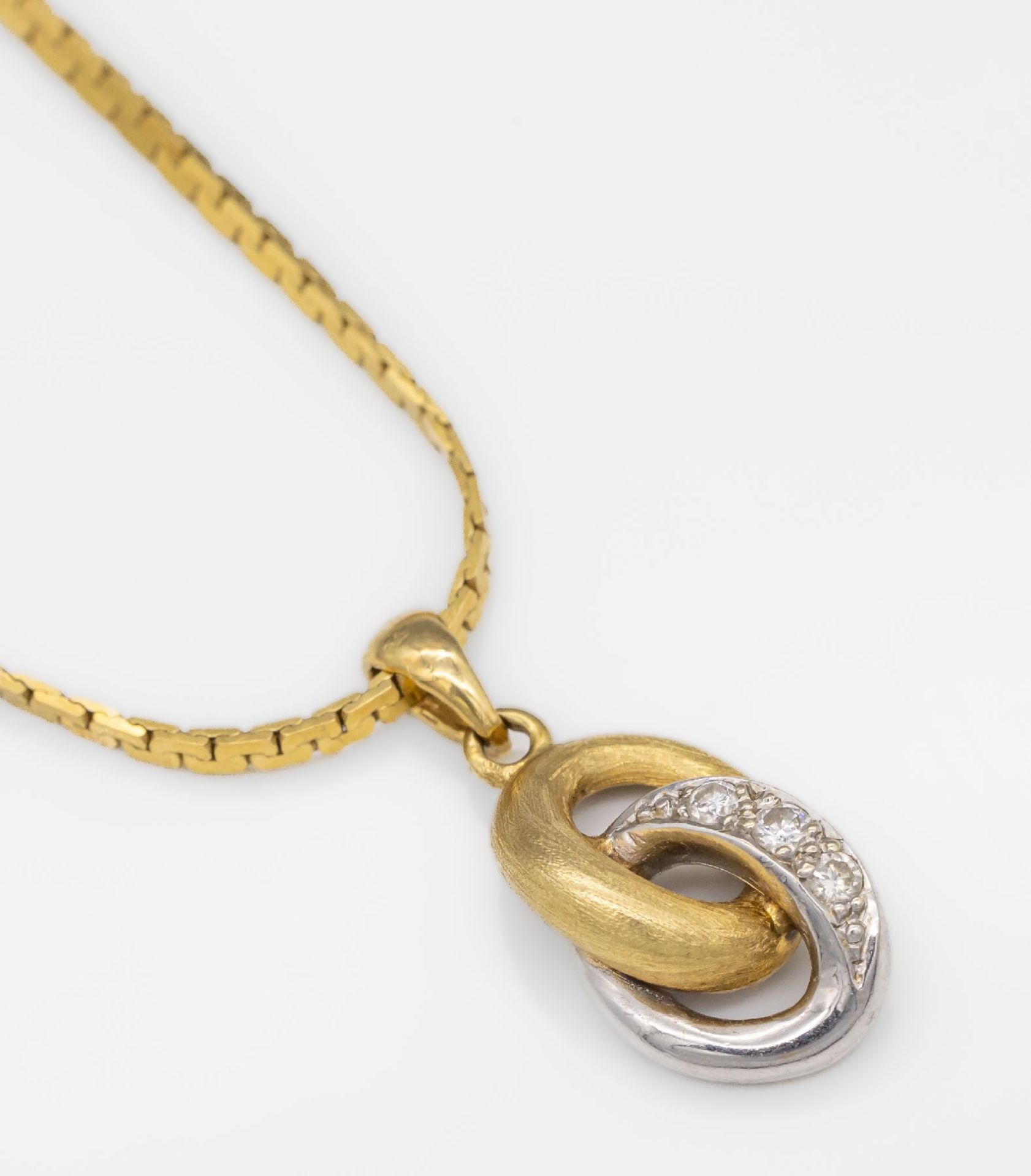 14 kt Gold Brillant-Anhänger, GG/WG 585/000, an Kette GG