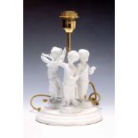 Tischlampe mit drei Porzellanfiguren, 2.H.20.Jh.,