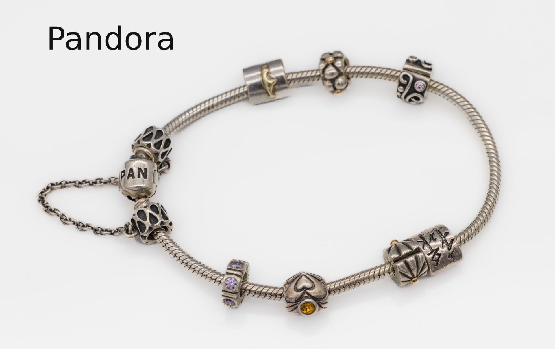 PANDORA Armband mit 9 Charms, Silber,   3 Charms mit GG, 1