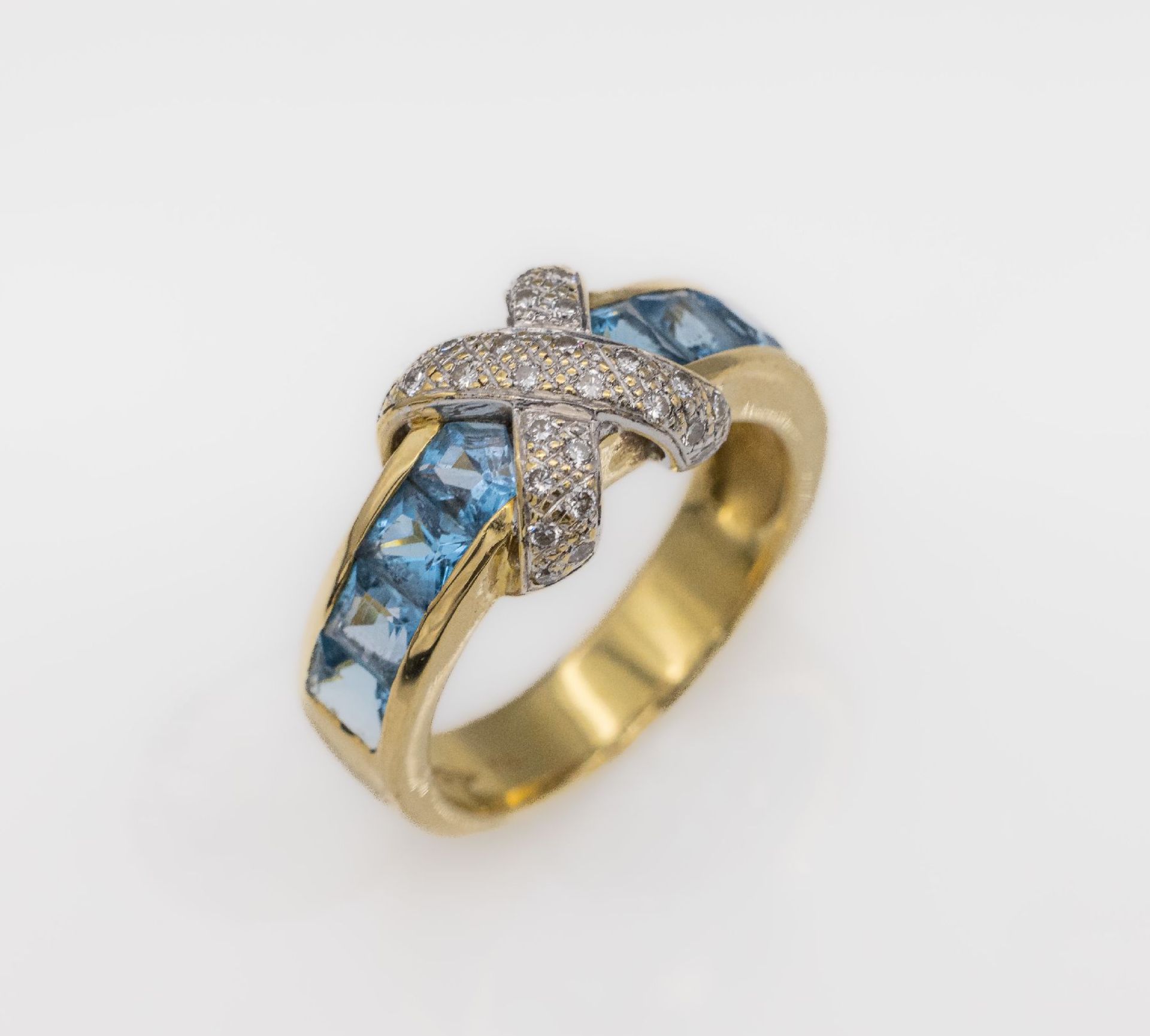 18 kt Gold Topas-Diamant-Ring,   GG/WG 750/ 000, 8 facett.