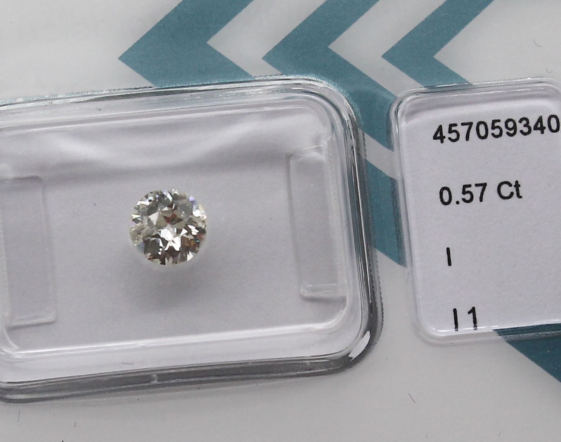 Diamant 0.57 ct l. get. Weiß(I)/p1,(besch.) verschweißt, - Image 2 of 2