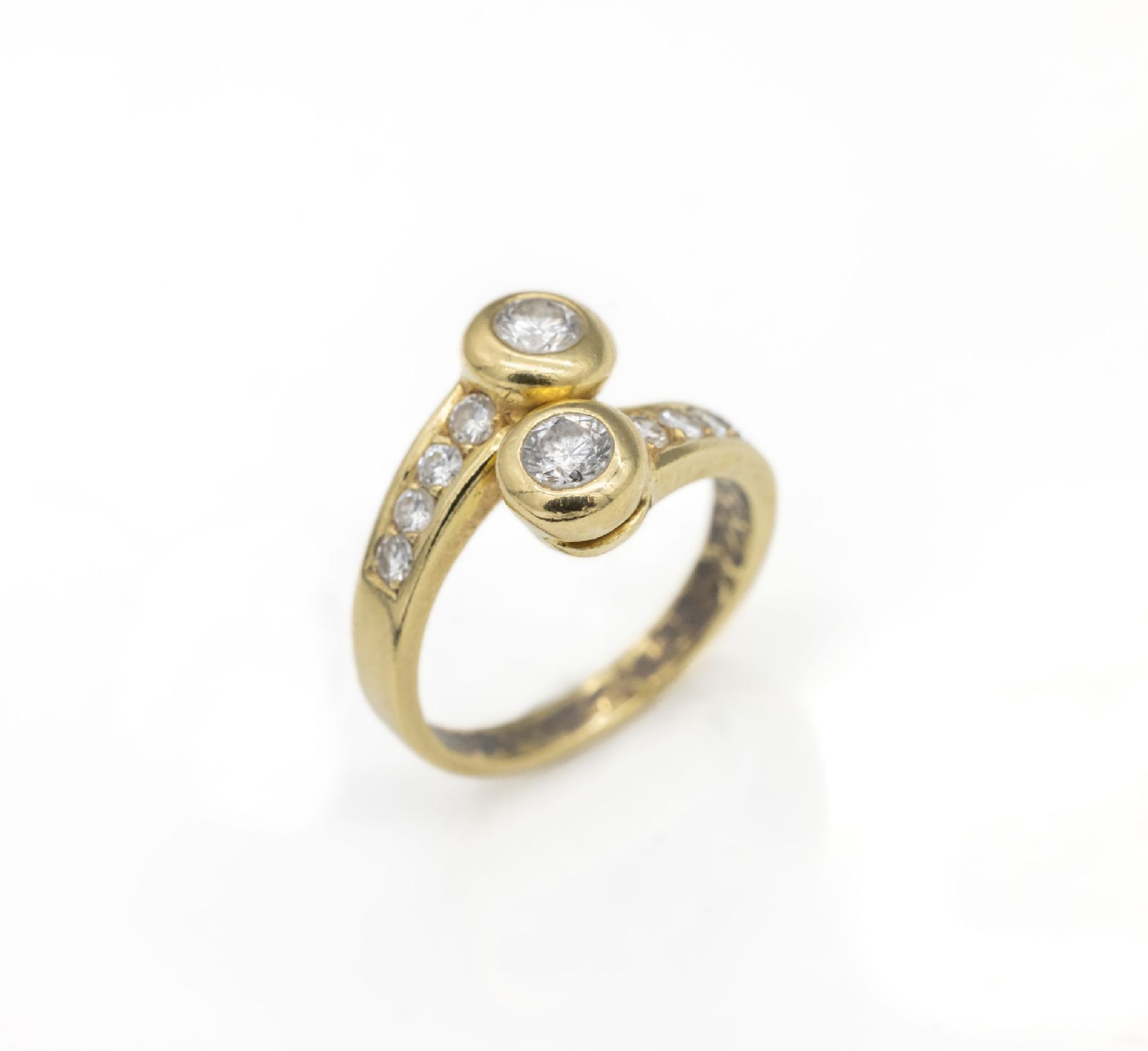 18 kt Gold Brillant-Ring,   GG 750/000, asymm. Ringkopf, 2