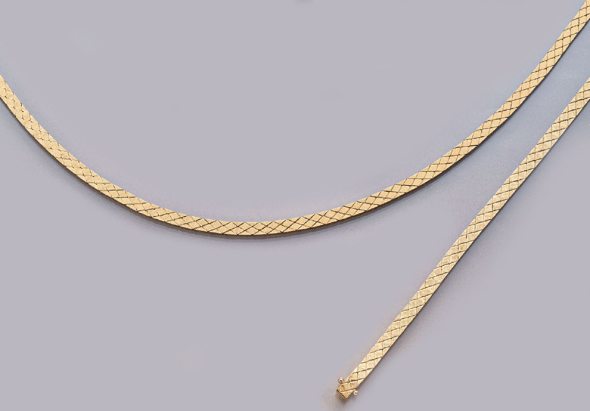 14 kt Gold Schmuckset: Collier und Armband, GG 585/000,