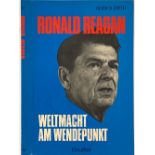 RONALD REAGAN (1911-2004) Book signed "Ronald Reagan" on the dust jacket. "Ronald Reagan - Weltmacht