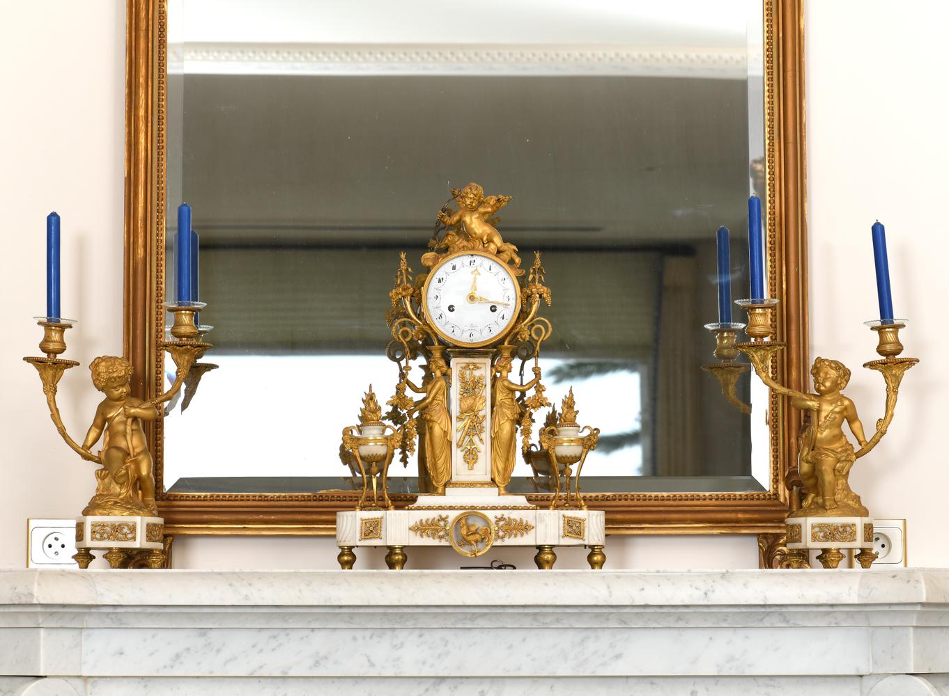 A PAIR OF LOUIS XVI STYLE GILT-BRONZE AND MARBLE PUTTI CANDLE HOLDERS, 19th century - Image 2 of 2