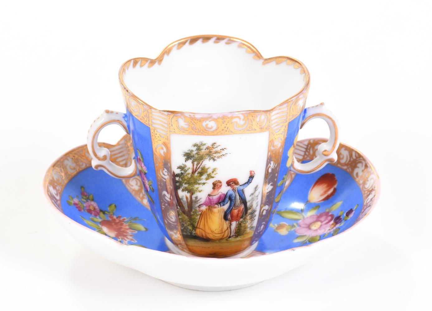 DOUBLE HANDLED PORCELAIN CUP AND SAUCER, 19th century