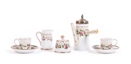 SÈVRES ‘TÊTE-À-TÊTE’ COFFEE PORCELAIN SERVICE WITH ‘PARTRIDGE EYE’ AND ROSE DECORATION AND SILVER RI