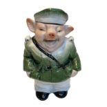 CERAMIC PIG FIGURINE IN MILITARY CLOTHES