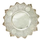 A LARGE PARCEL-GILT SILVER PRESENTATION DISH WITH A CARVED EDGE, WITH SCROLLING FOLIAGE
