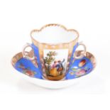 DOUBLE HANDLED PORCELAIN CUP AND SAUCER, 19th century