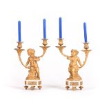 A PAIR OF LOUIS XVI STYLE GILT-BRONZE AND MARBLE PUTTI CANDLE HOLDERS, 19th century