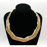 GOLD AND DIAMOND NECKLACE, CIRCA 1970S