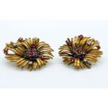 PAIR OF GOLD AND DIAMOND FLOWER EARCLIPS