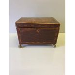 A Mahogany Inlaid Tea Caddy With Brass Ball & Claw Feet