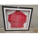 A Chinese Silk Red Jacket In Frame