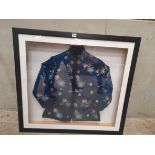 A Chinese Silk Blue Jacket In Frame