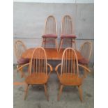 An Ercol Dining Table & 6 Chairs H71cm x L153cm x W90cm