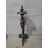 A Mahogany Carved Candleholder