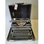 An Underwood Champion Typewriter In Case