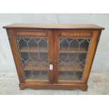 A Small Oak Leaded Glazed China Cabinet