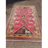 A Pink Patterned Rug L244cm x W153cm