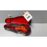 A Miniature Violin In Case