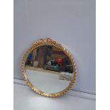 A Round Gilt Mirror