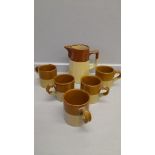 A Wedgwood Dressing Table Set (Damaged), Langley Stoneware Coffee Jug, 4 Moira Stoneware Coffee Cups