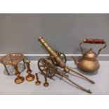 A Brass Cannon, Storage Jars, Trivots, Candlesticks Etc