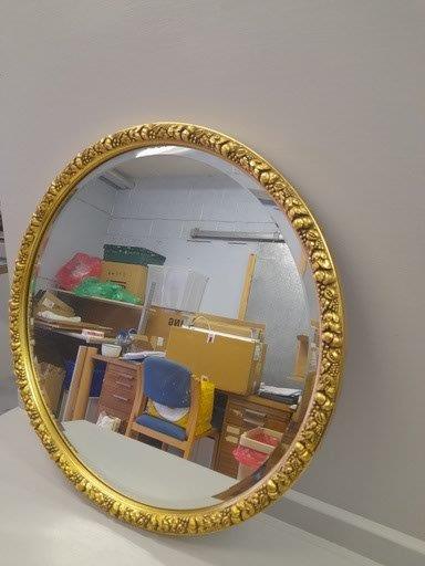 A Gilt Round Mirror