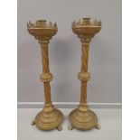 A Pair Of Brass & Copper Claw Footed Church Candle Holders