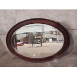 A Mahogany Oval Wall Mirror