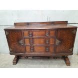 An Oak Sideboard H108cm x W152cm x D54cm