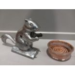 A Squirrel Nutcracker & Plated Wine Coaster