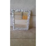 A Floral Edged Mirror