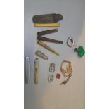A Box Including Cigarette Holders, Pocket Knives, Watch Chain Etc