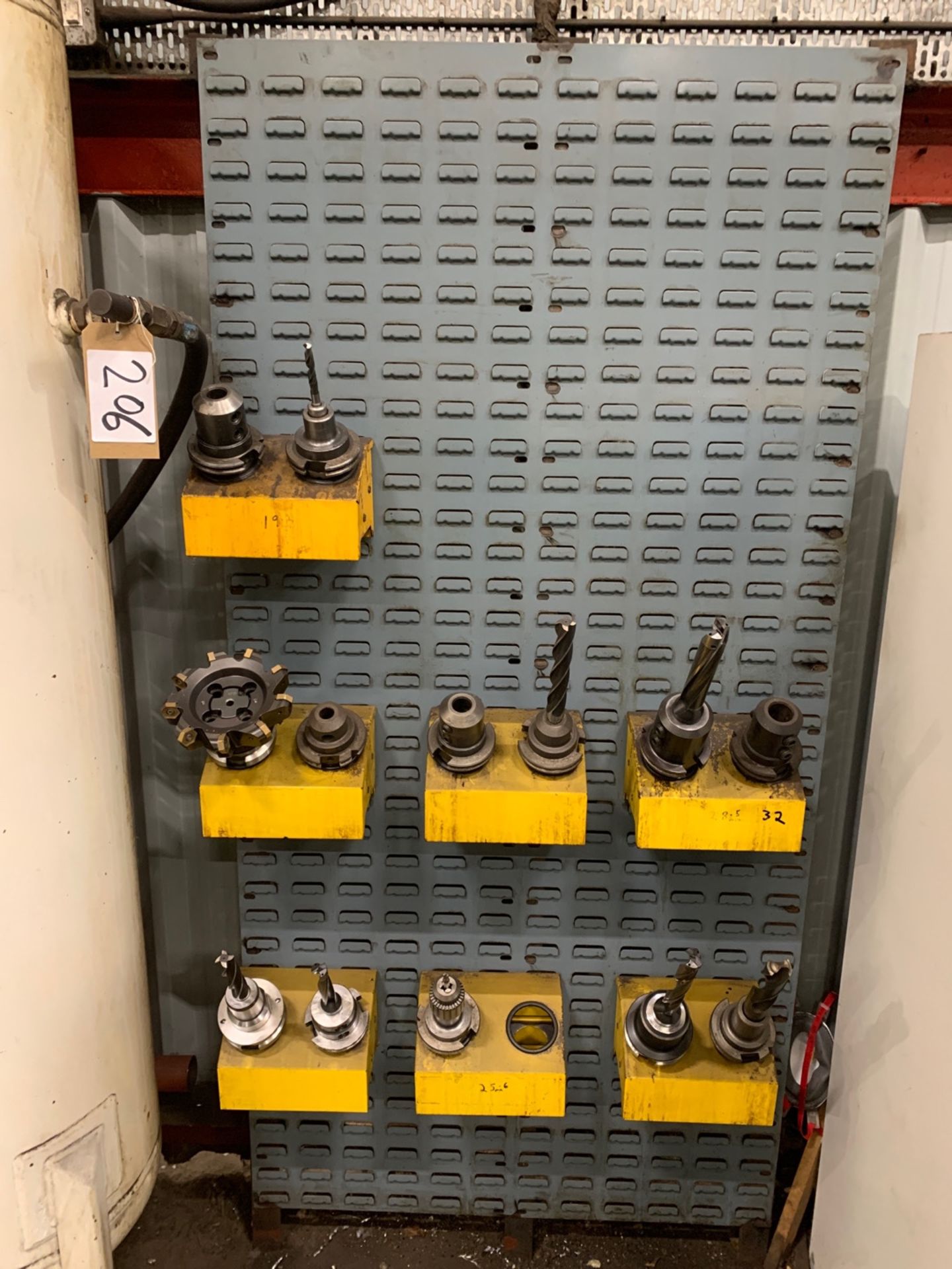 Tooling on Wall Mounted Rack as Photographed