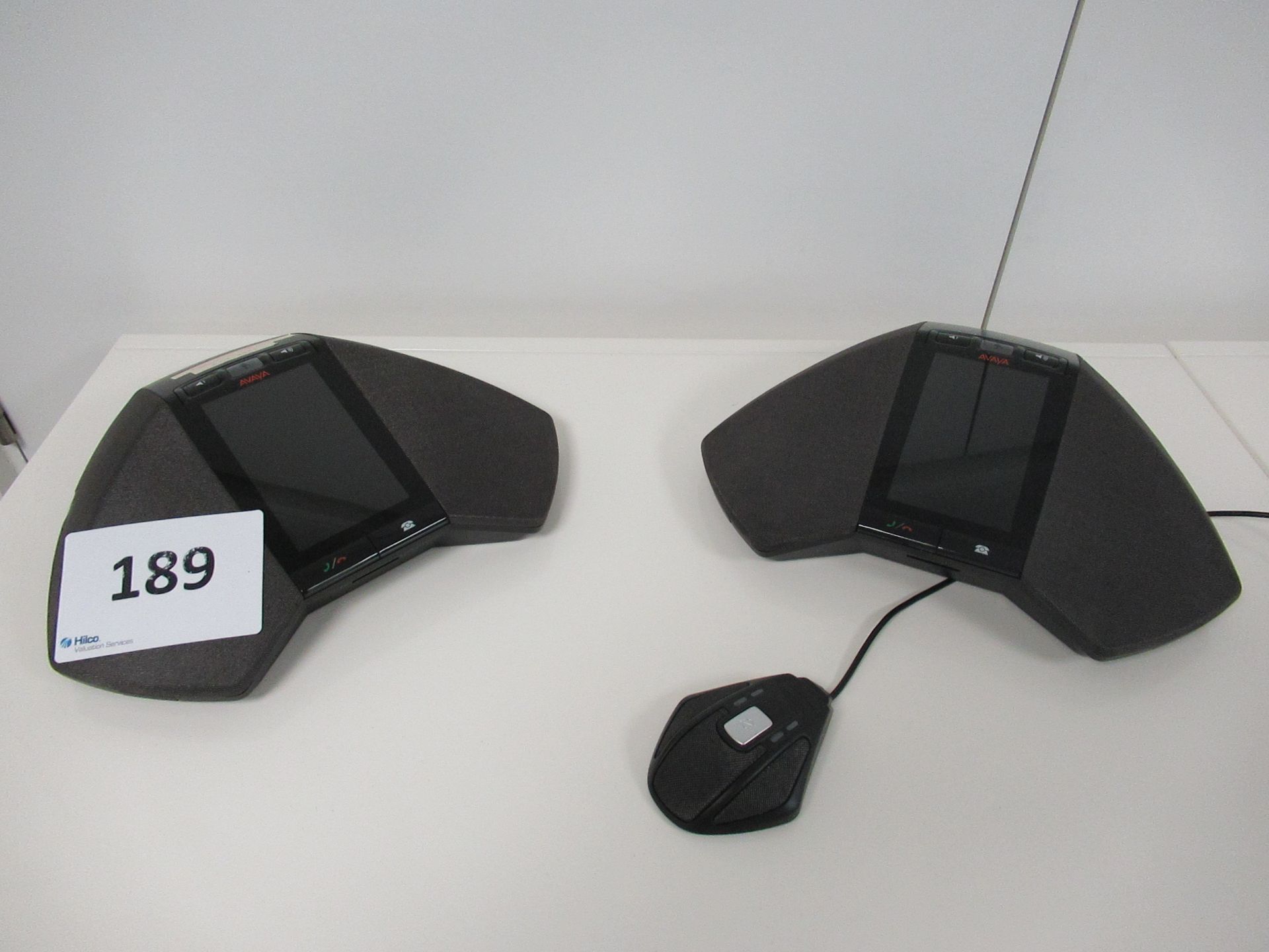 A Pair of Avaya B189 IP Conference Phones with a Avaya B100 Expansion Microphone