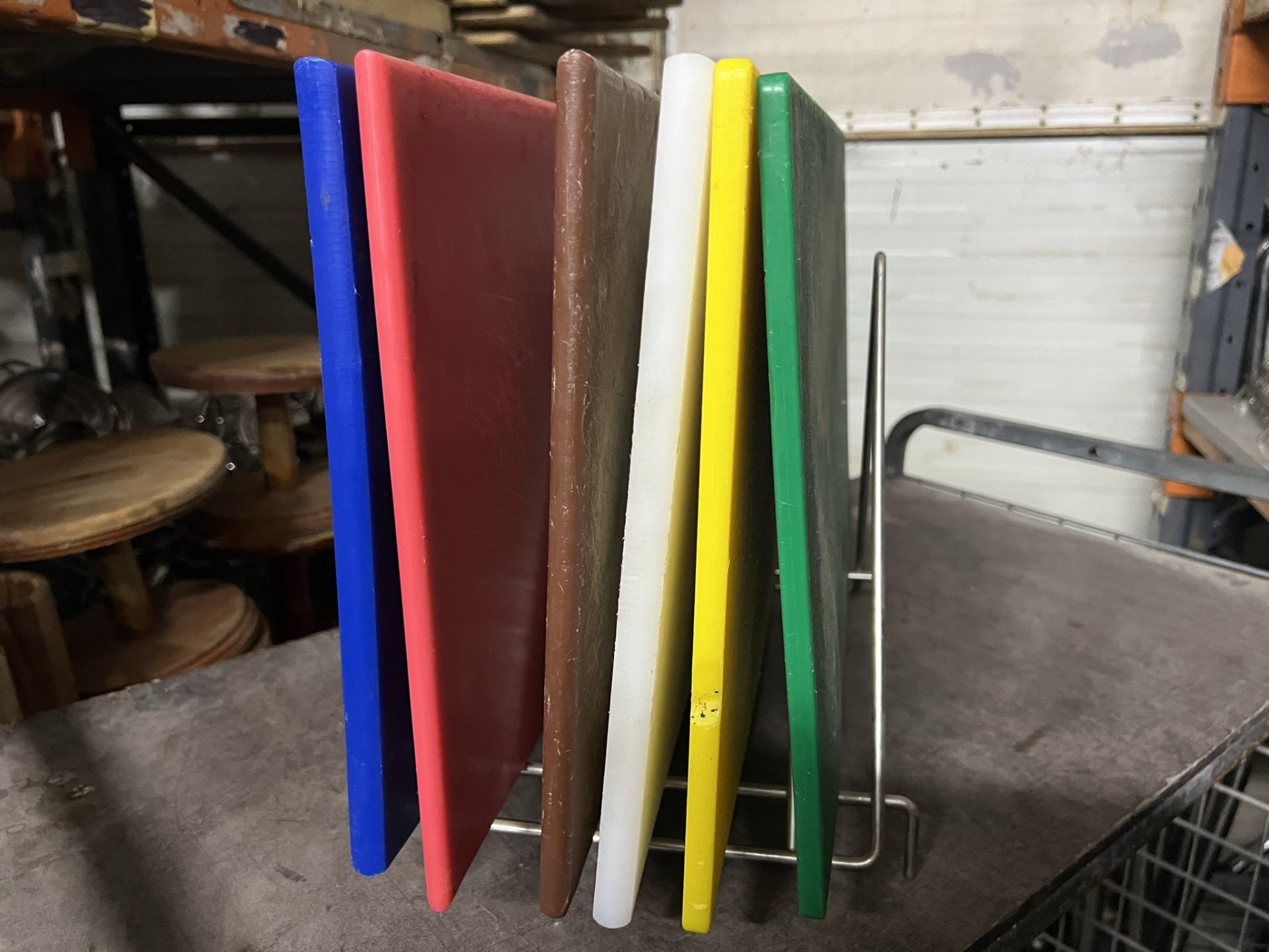 Set of 6 coloured chopping boards and stands