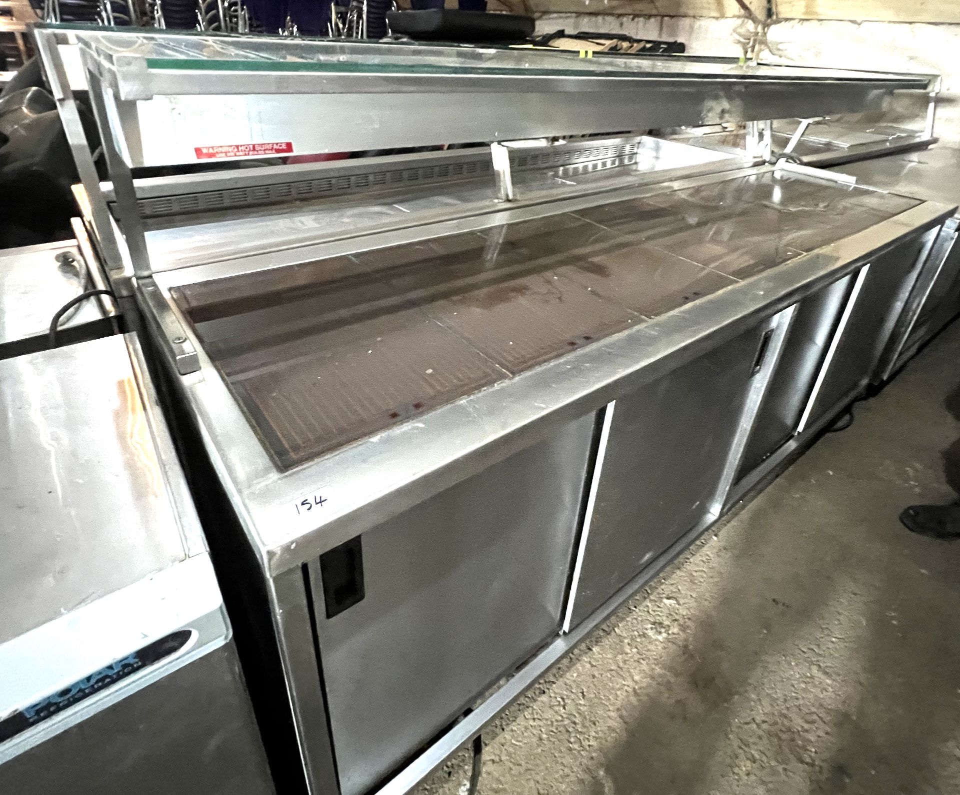 Heated servery unit with heated hot plates, heated cupboards and gantry, 2400 x 700mm deep