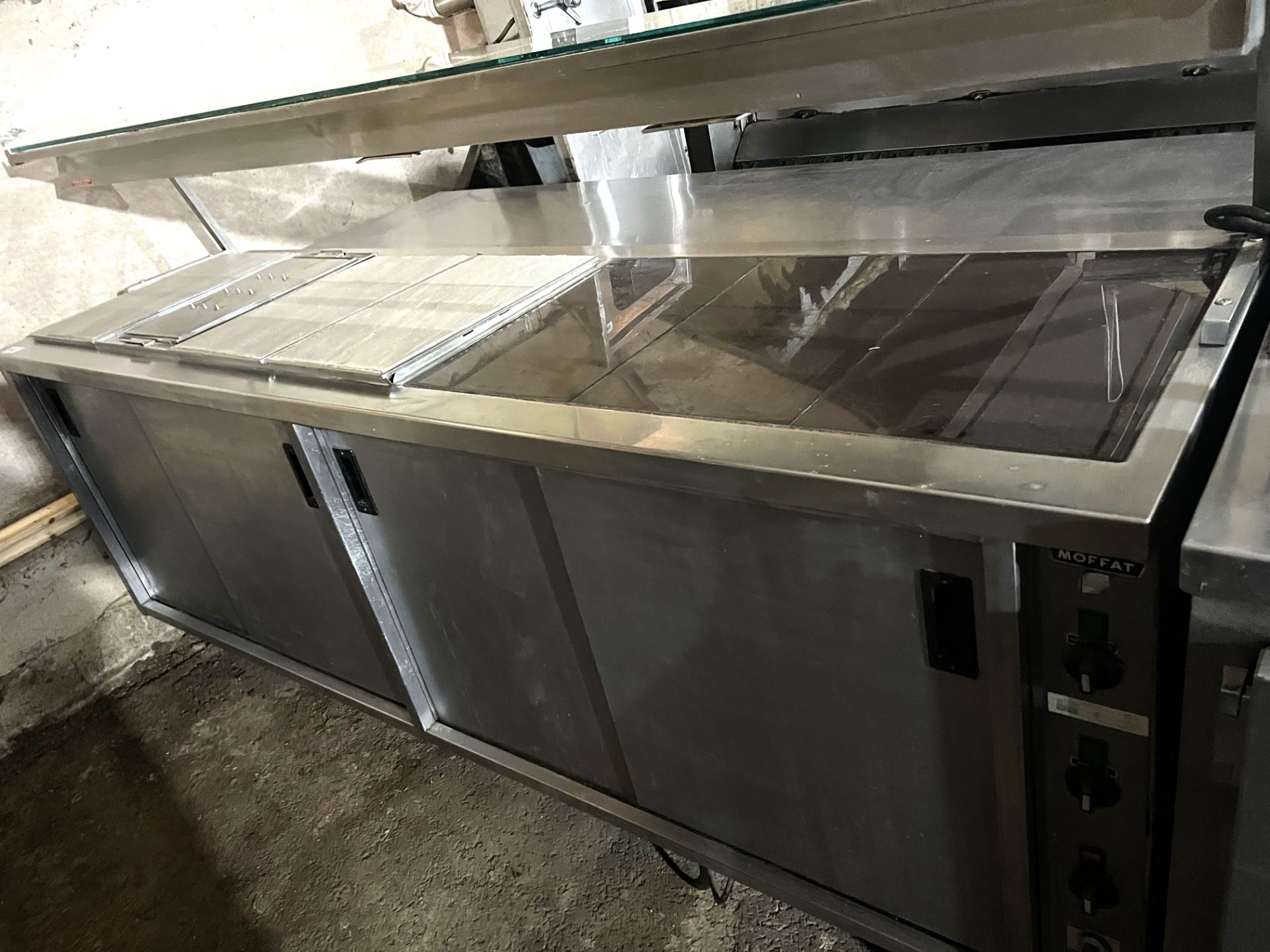 Heated servery unit with heated hot plates, heated cupboards and gantry, 2400 x 700mm deep