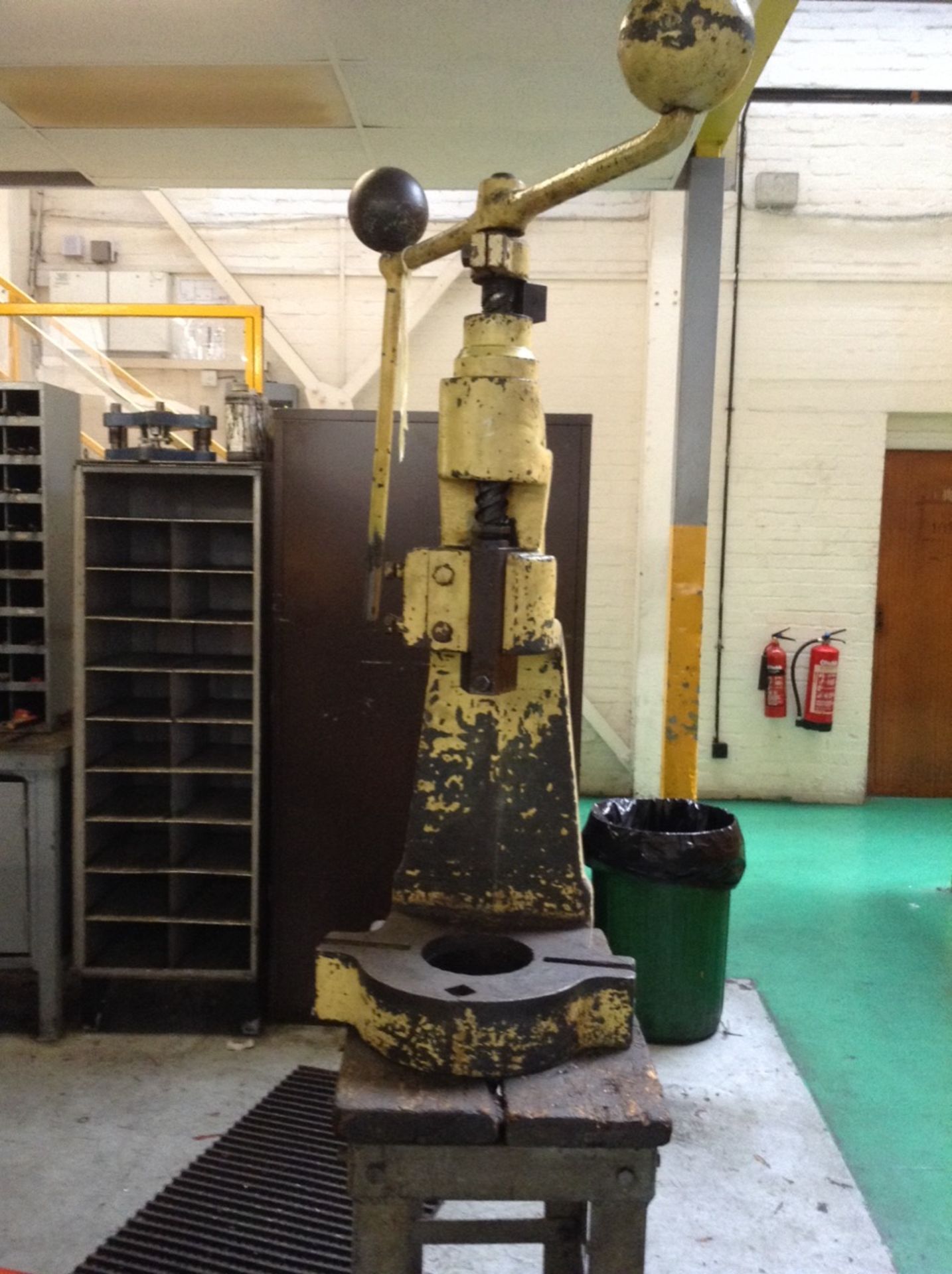 1 Norton, 5T, Fly press on a fabricated steel table