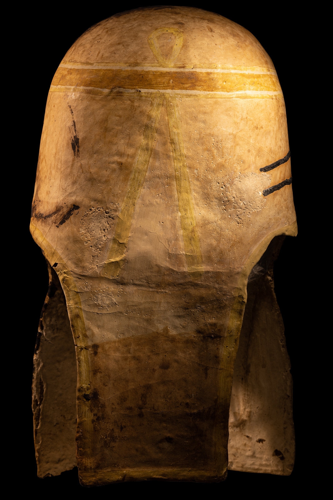 An Egyptian Gilt Cartonnage Mummy Mask Height 18 1/2 inches (47 cm). - Image 11 of 11