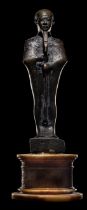 An Egyptian Bronze Ptah Height 7 inches (18 cm).