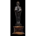 An Egyptian Bronze Ptah Height 7 inches (18 cm).