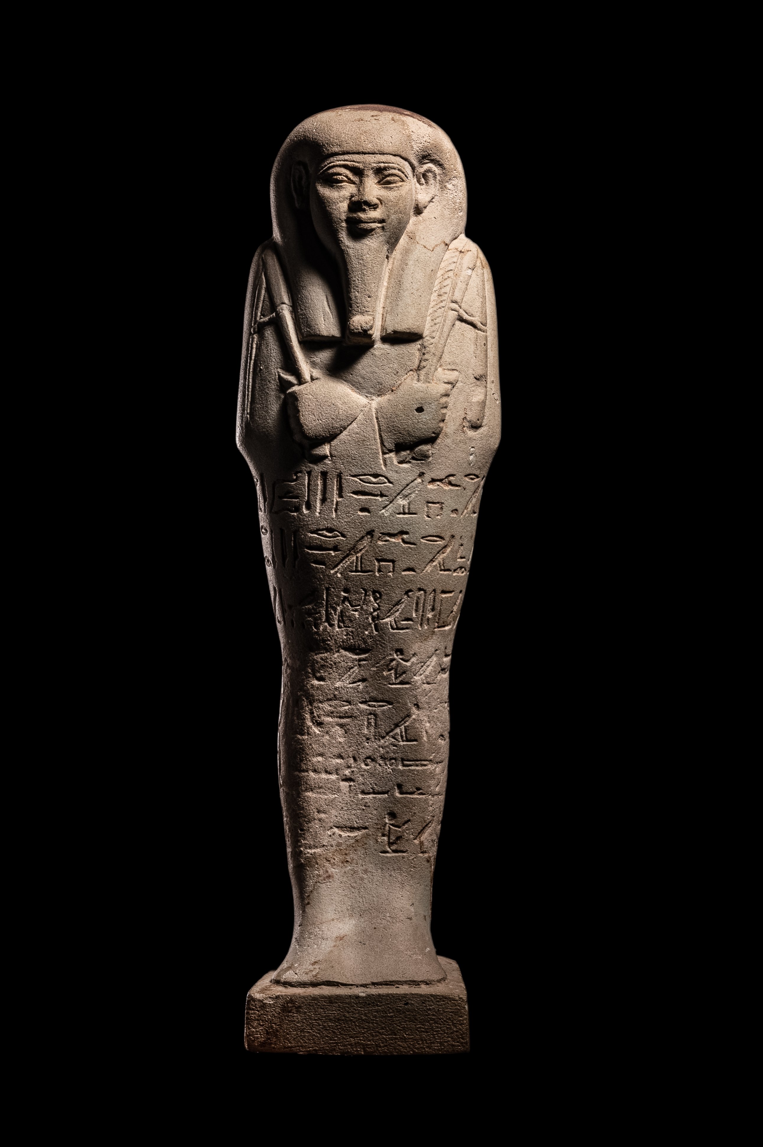 An Egyptian Faience Ushabti for Horiraa Height 7 inches (17.8 cm).