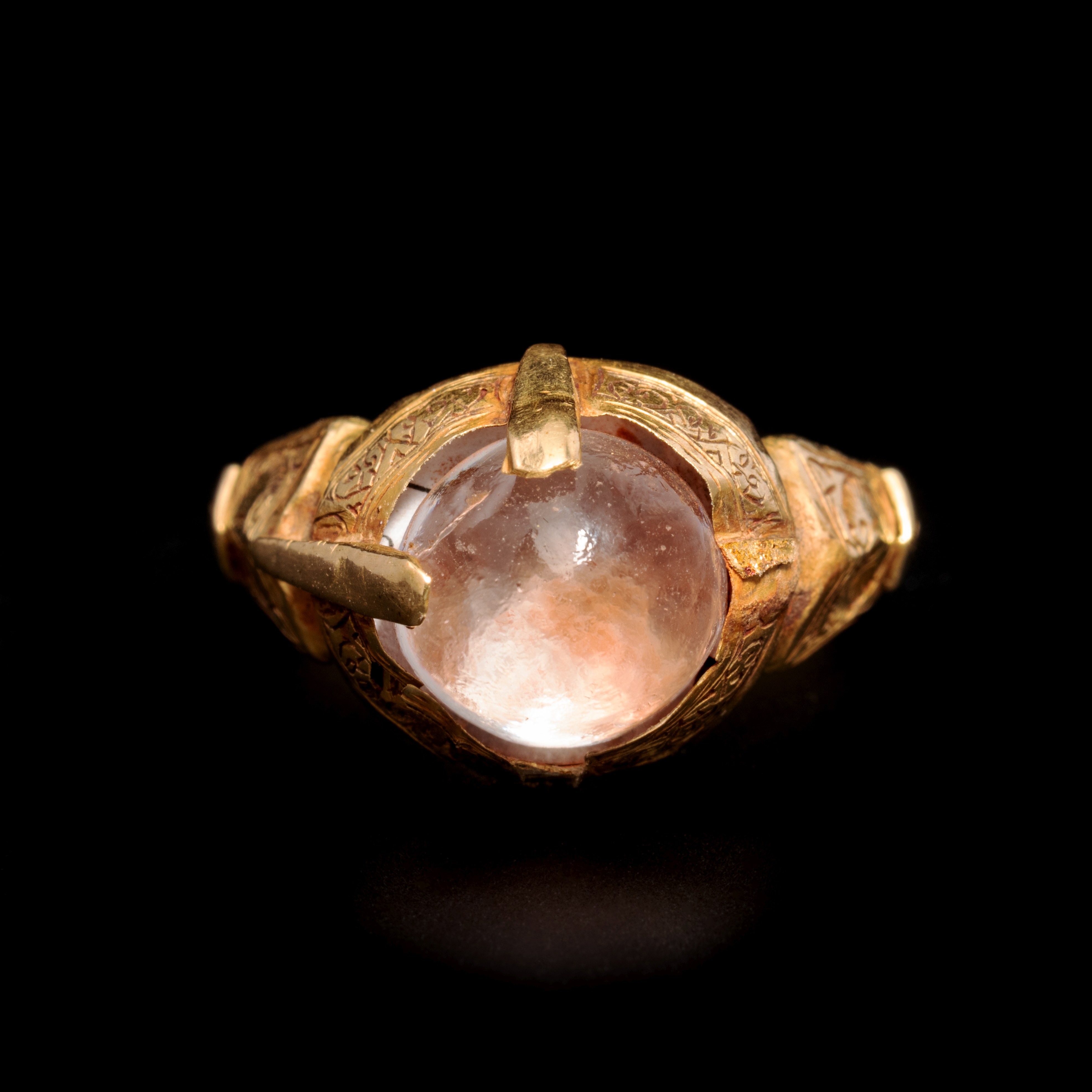An Islamic Gold Finger Ring with Rock Crystal Cabochon Ring size 3 3/4; Diameter of rock crystal 3/4 - Image 2 of 2
