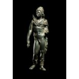 A Roman Bronze Apollo  Height 4 1/4 inches (11 cm).