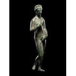 A Roman Bronze Venus with Silver Inlaid Eyes  Height 5 13/32 inches (13.7 cm).